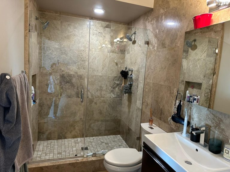 Glass shower and tile cleaned and polished