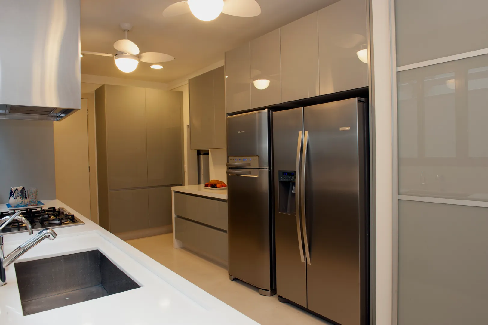 Clean kitchen with polished stainless steel appliances